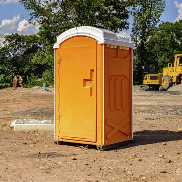 how often are the portable restrooms cleaned and serviced during a rental period in Encampment WY